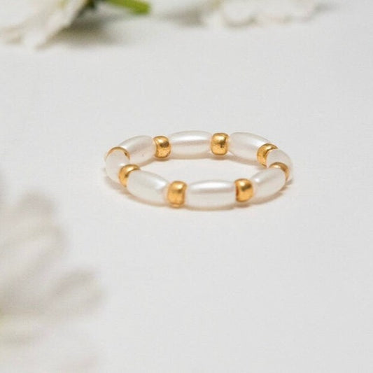 white and gold stretch ring