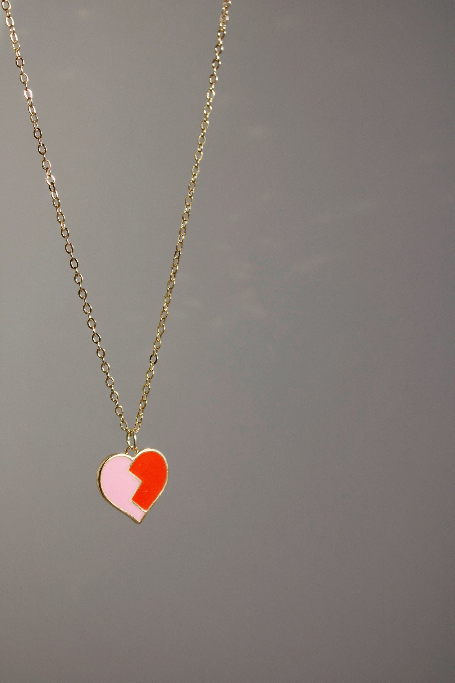 red and pink broken heart necklace