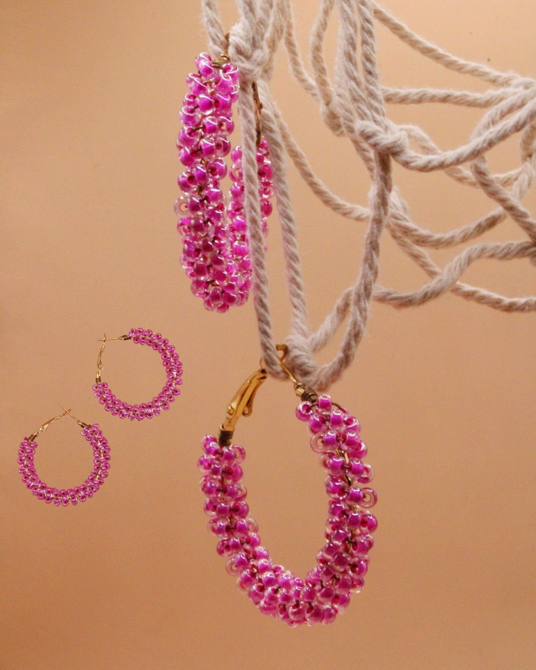 pink beaded hoop earrings